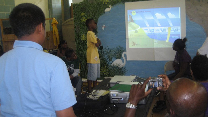 Young Boy Presenting at the Science-in-the-Park Workshop